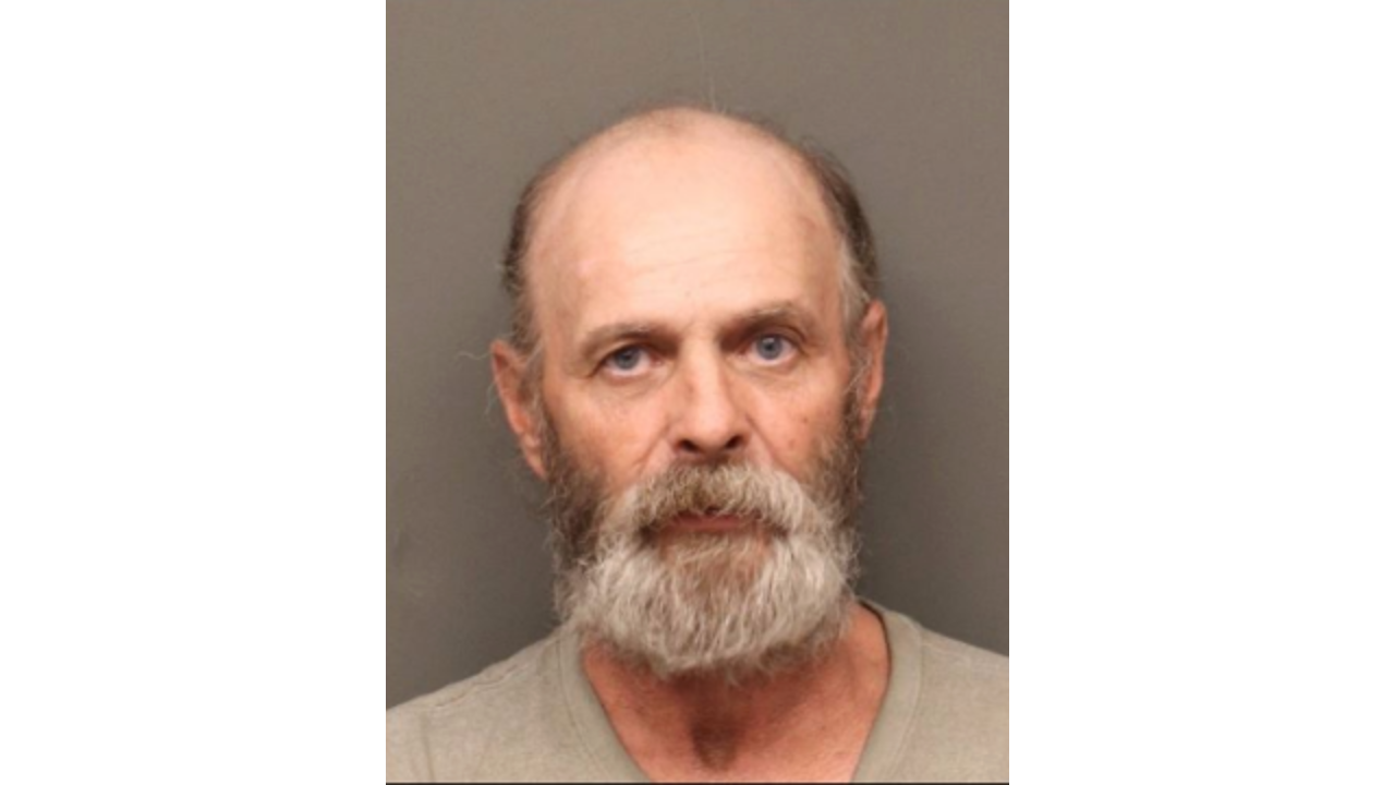 Scott-Smith.png, a man with a beard and serious expression